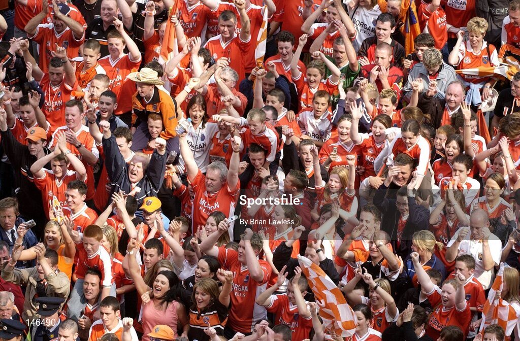 11 July 2004; Armagh fans celebrate at the end of the match. Bank of Ireland Ulster Senior Football Championship Final, Armagh v Donegal, Croke Park, Dublin. Picture credit; Brian Lawless / SPORTSFILE