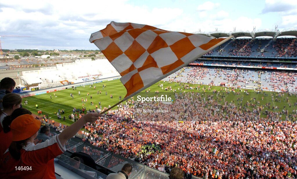 11 July 2004; Armagh fans celebrate at the end of the game. Bank of Ireland Ulster Senior Football Championship Final, Armagh v Donegal, Croke Park, Dublin. Picture credit; Brian Lawless / SPORTSFILE