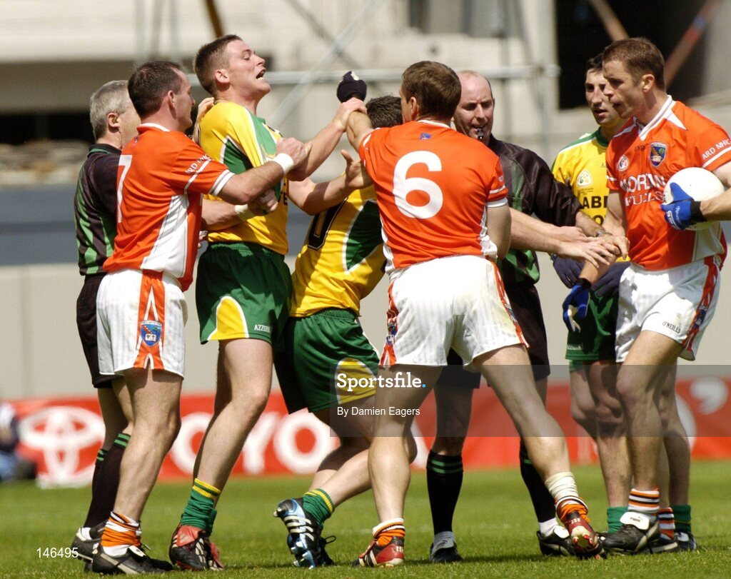 11 July 2004; Armagh's Aidan O'Rourke, (7), Kieran McGeeney, (6) and Paul McGrane struggle with Donegal's Brendan Boyle, left, and Michael Hegarty during the match. Bank of Ireland Ulster Senior Football Championship Final, Armagh v Donegal, Croke Park, Dublin. Picture credit; Damien Eagers / SPORTSFILE