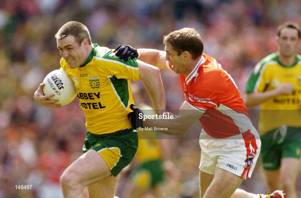 11 July 2004; John Gildea, Donegal, is tackled by Kieran McGeeney, Armagh. Bank of Ireland Ulster Senior Football Championship Final, Armagh v Donegal, Croke Park, Dublin. Picture credit; Matt Browne / SPORTSFILE