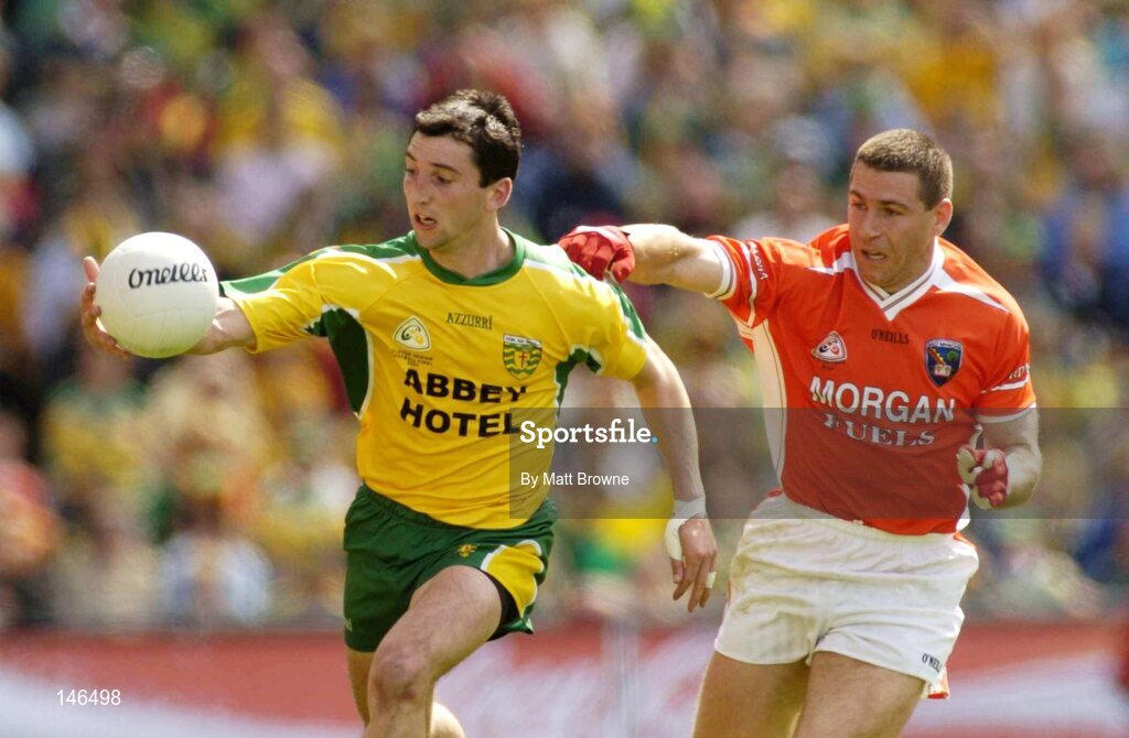 11 July 2004; Michael Hegarty, Donegal, is tackled by Diarmuid Marsden, Armagh. Bank of Ireland Ulster Senior Football Championship Final, Armagh v Donegal, Croke Park, Dublin. Picture credit; Matt Browne / SPORTSFILE