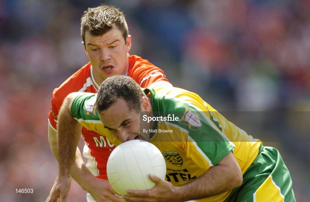11 July 2004; Shane Carr, Donegal, is tackled by Ronan Clarke, Armagh. Bank of Ireland Ulster Senior Football Championship Final, Armagh v Donegal, Croke Park, Dublin. Picture credit; Matt Browne / SPORTSFILE
