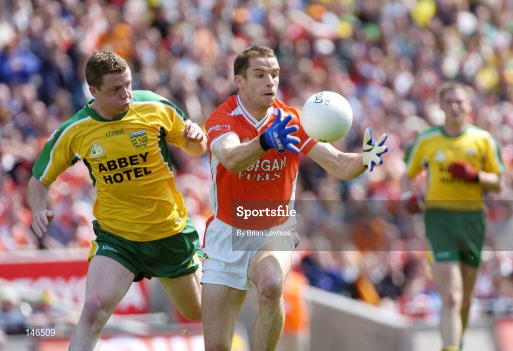 11 July 2004; Paul McGrane, Armagh, in action against Stephen McDermott, Donegal. Bank of Ireland Ulster Senior Football Championship Final, Armagh v Donegal, Croke Park, Dublin. Picture credit; Brian Lawless / SPORTSFILE