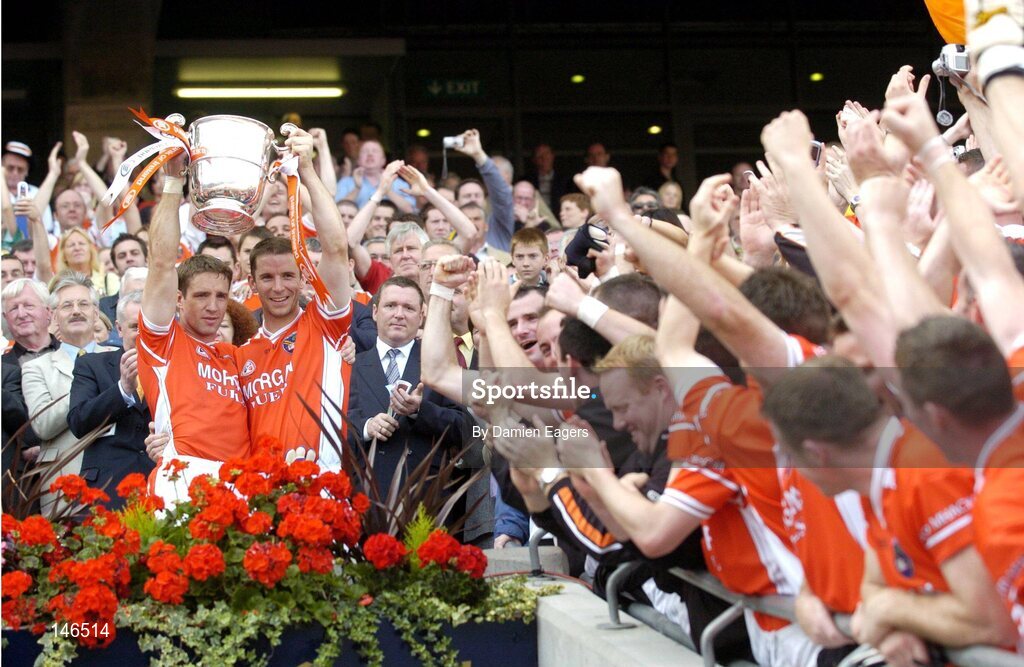 11 July 2004; Armagh captain Kieran McGeeney and teammate Paul McGrane lift the Anglo Celt cup. Bank of Ireland Ulster Senior Football Championship Final, Armagh v Donegal, Croke Park, Dublin. Picture credit; Damien Eagers / SPORTSFILE