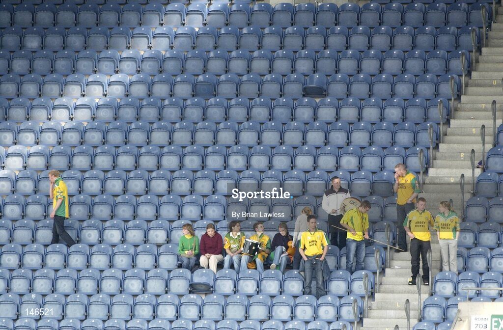 11 July 2004; Dissapointed Donegal fans watch Armagh lift the cup after the game. Bank of Ireland Ulster Senior Football Championship Final, Armagh v Donegal, Croke Park, Dublin. Picture credit; Brian Lawless / SPORTSFILE