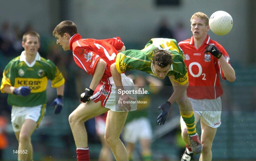 11 July 2004; Rory Keating, Kerry, in action against Ray Carey, Cork. Munster Minor Football Championship Final, Cork v Kerry, Gaelic Grounds, Limerick. Picture credit; Brendan Moran / SPORTSFILE