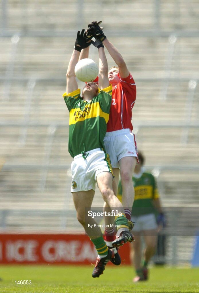 11 July 2004; Andrew O'Sullivan, Cork, in action against Brian Moran, Kerry. Munster Minor Football Championship Final, Cork v Kerry, Gaelic Grounds, Limerick. Picture credit; Brendan Moran / SPORTSFILE
