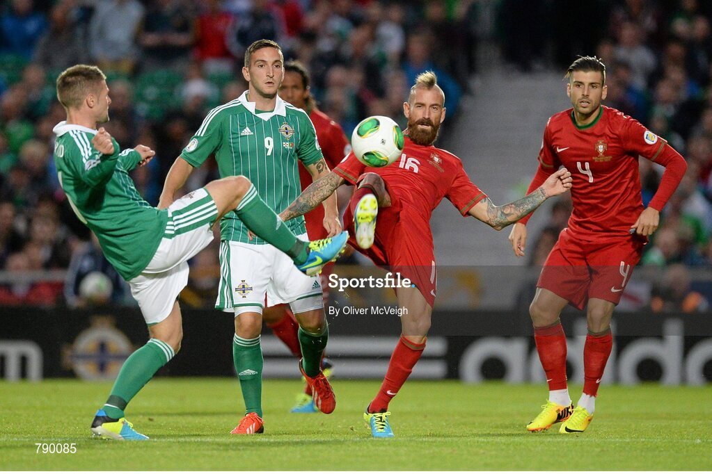 6 September 2013; Oliver Norwood, Northern Ireland, in action against Raul Meireles, Portugal. 2014 FIFA World Cup Qualifier, Group F, Northern Ireland v Portugal, Windsor Park, Belfast.  Picture credit: Oliver McVeigh / SPORTSFILE