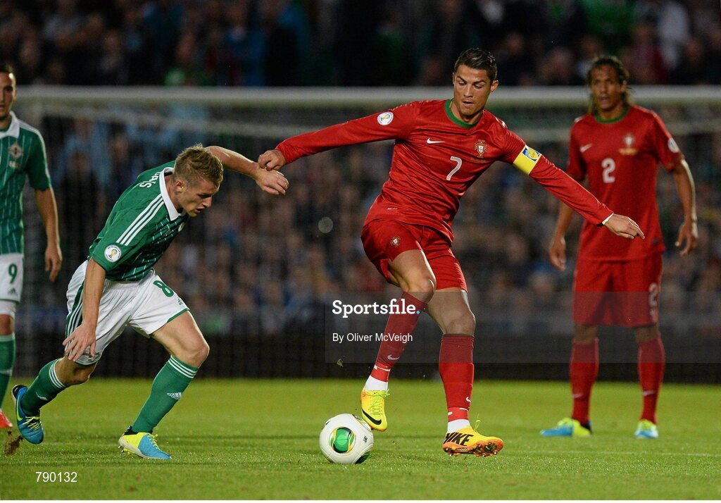 6 September 2013; Christano Ronaldo, Portugal, in action against Steven Davis, Northern Ireland. 2014 FIFA World Cup Qualifier, Group F, Northern Ireland v Portugal, Windsor Park, Belfast.  Picture credit: Oliver McVeigh / SPORTSFILE