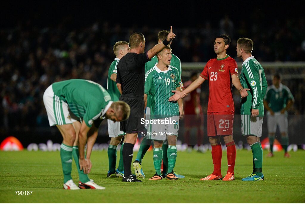 6 September 2013; Referee Danny Makkelie sends off Helder Postiga, Portugal, after a first half incident. 2014 FIFA World Cup Qualifier, Group F, Northern Ireland v Portugal, Windsor Park, Belfast.  Picture credit: Oliver McVeigh / SPORTSFILE