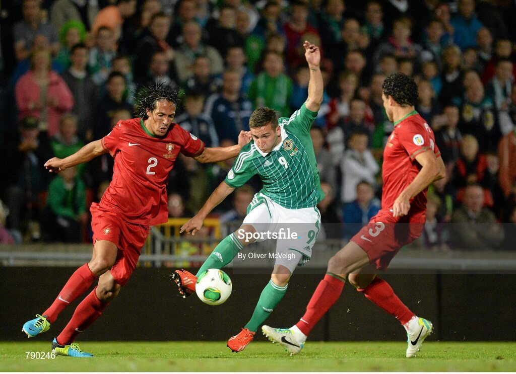 6 September 2013; Martin Paterson, Northern Ireland, in action against Bruno Alves, left, and Pepe, Portugal. 2014 FIFA World Cup Qualifier, Group F, Northern Ireland v Portugal, Windsor Park, Belfast.  Picture credit: Oliver McVeigh / SPORTSFILE