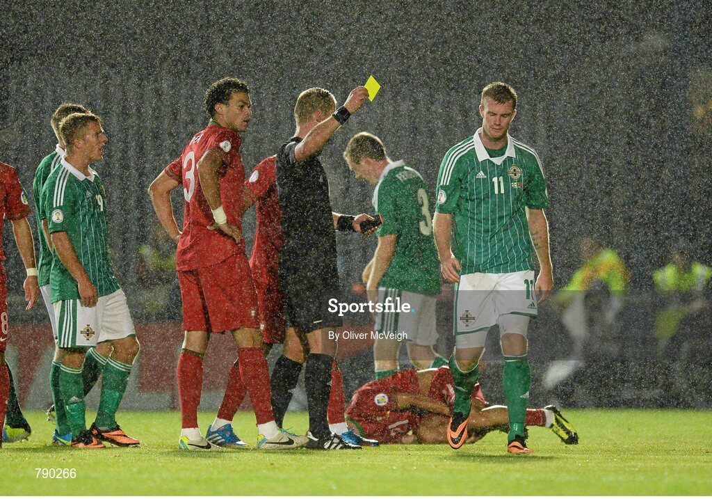 6 September 2013; Chris Brunt, Northern Ireland, is shown his second yellow card by referee Danny Makkelie and subsequently sent off. 2014 FIFA World Cup Qualifier, Group F, Northern Ireland v Portugal, Windsor Park, Belfast.  Picture credit: Oliver McVeigh / SPORTSFILE
