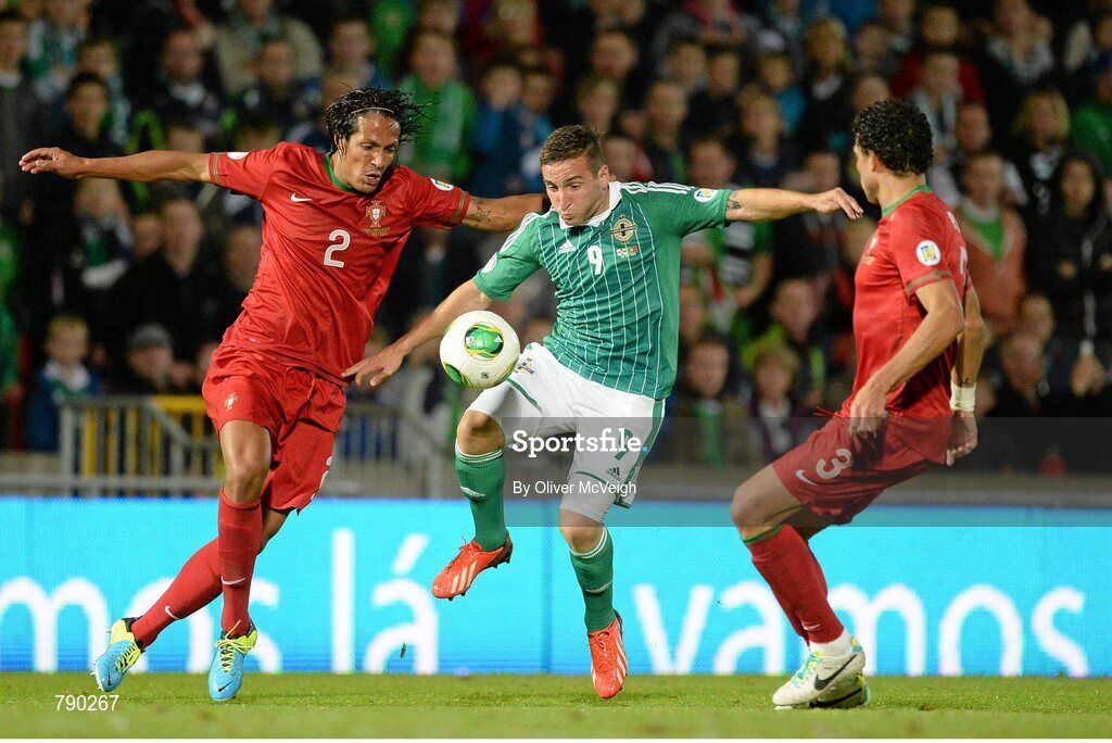 6 September 2013; Martin Paterson, Northern Ireland, in action against Bruno Alves, left, and Pepe, Portugal. 2014 FIFA World Cup Qualifier, Group F, Northern Ireland v Portugal, Windsor Park, Belfast.  Picture credit: Oliver McVeigh / SPORTSFILE