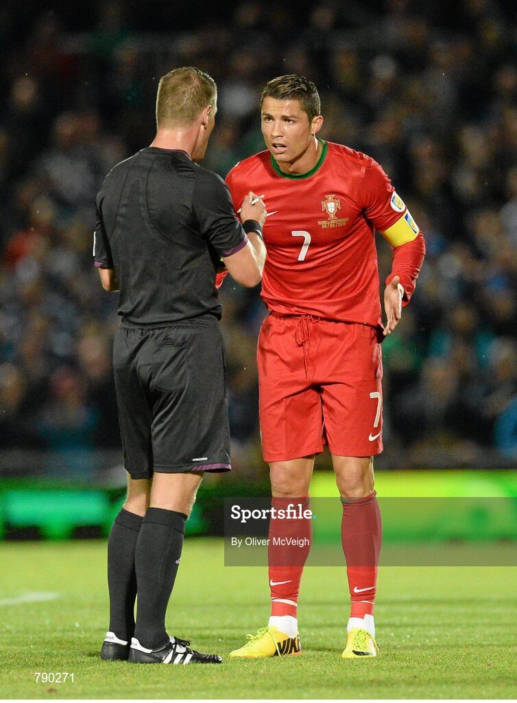 6 September 2013; Referee Danny Makkelie speaking to Christano Ronaldo, Portugal, after showing him a yellow card. 2014 FIFA World Cup Qualifier, Group F, Northern Ireland v Portugal, Windsor Park, Belfast.  Picture credit: Oliver McVeigh / SPORTSFILE