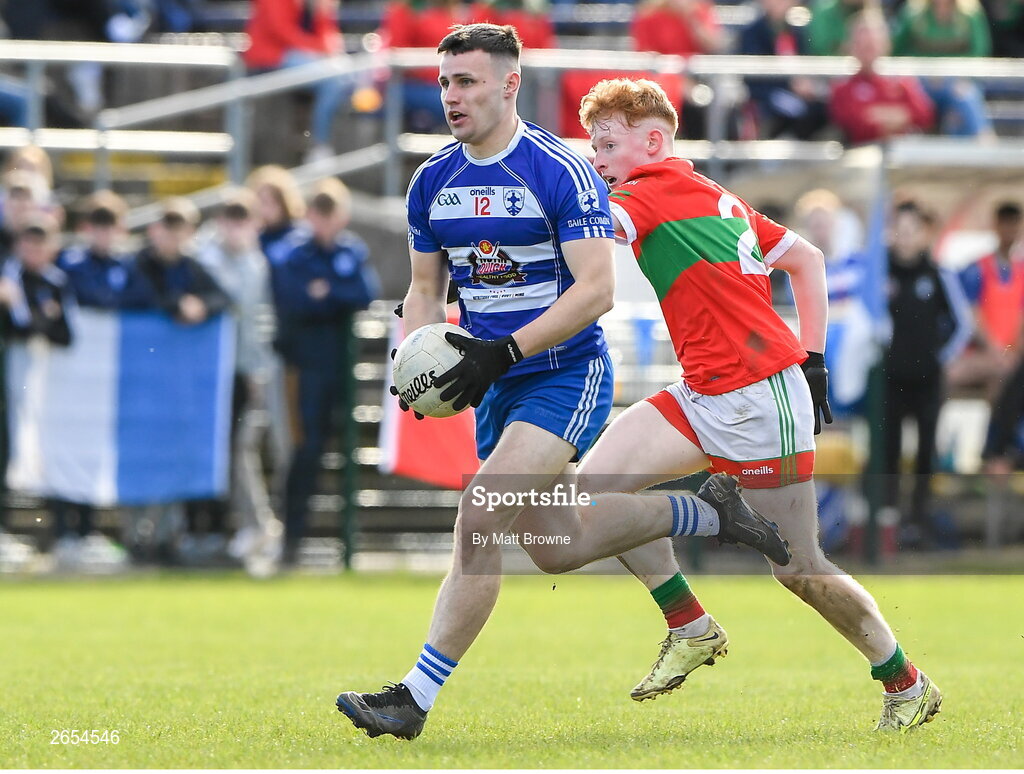 22 October 2023; Jordan McGarr of Blessington in action against Adam Byrne of Rathnew during the Wicklow County Senior Club Football Championship final between Blessington and Rathnew at Echelon Park in Aughrim, Wicklow. Photo by Matt Browne/Sportsfile