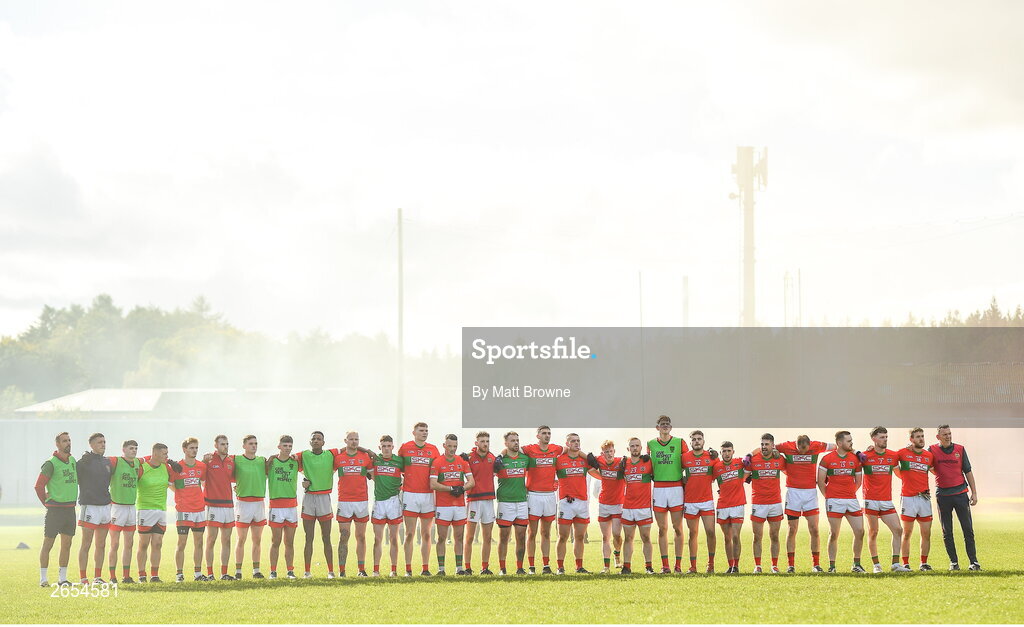 22 October 2023; Rathnew players stand during the National Anthem at the Wicklow County Senior Club Football Championship final between Blessington and Rathnew at Echelon Park in Aughrim, Wicklow. Photo by Matt Browne/Sportsfile