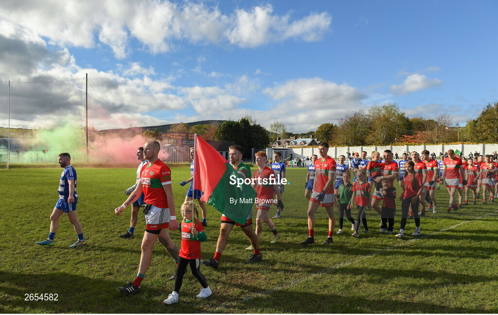 22 October 2023; Theo Smyth captain of Rathnew leads his team-mates in the prade before the Wicklow County Senior Club Football Championship final between Blessington and Rathnew at Echelon Park in Aughrim, Wicklow. Photo by Matt Browne/Sportsfile