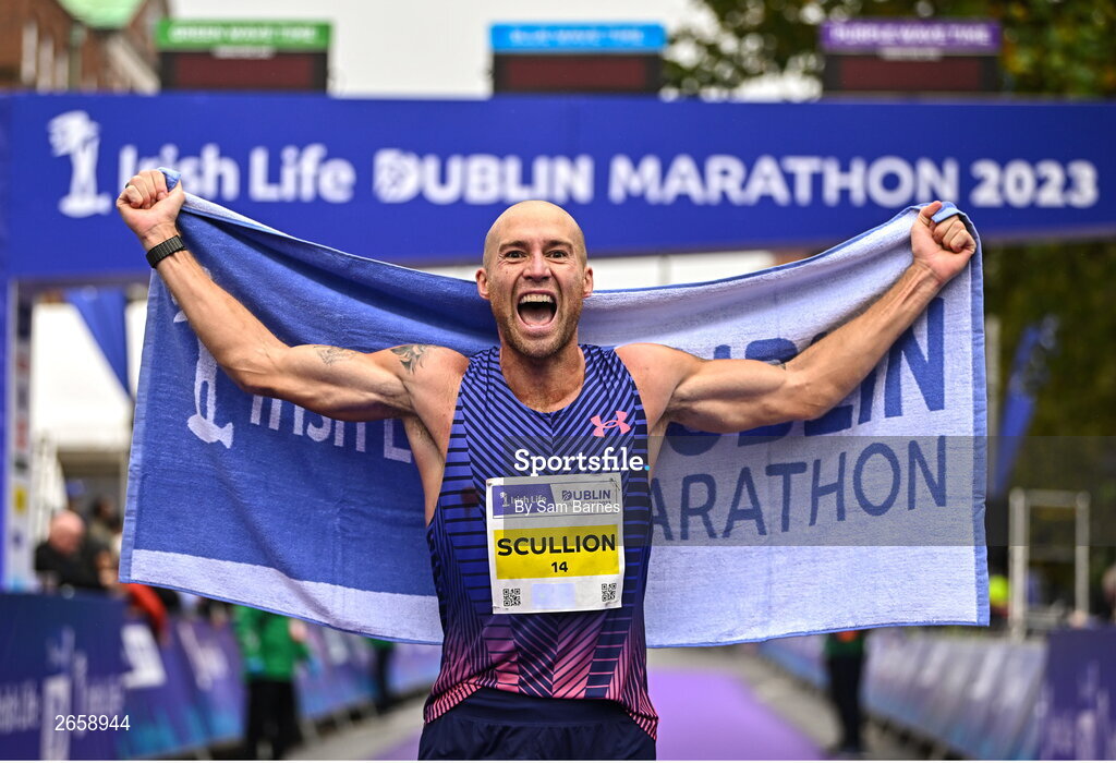 29 October 2023; Irish National Champion Stephen Scullion celebrates after the 2023 Irish Life Dublin Marathon. Thousands of runners took to the Fitzwilliam Square start line, to participate in the 42nd running of the Dublin Marathon. Photo by Sam Barnes/Sportsfile