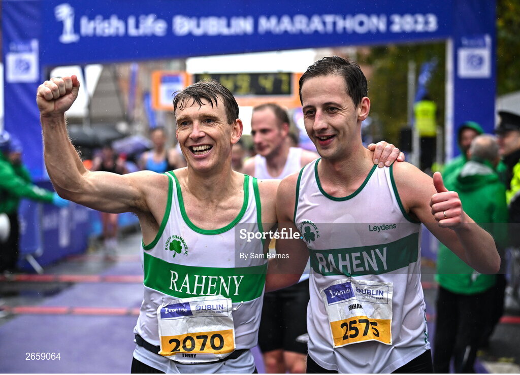 29 October 2023; Terry Keogh and Graham O'Dwyer of Raheny Shamrocks AC, Dublin, after the 2023 Irish Life Dublin Marathon. Thousands of runners took to the Fitzwilliam Square start line, to participate in the 42nd running of the Dublin Marathon. Photo by Sam Barnes/Sportsfile