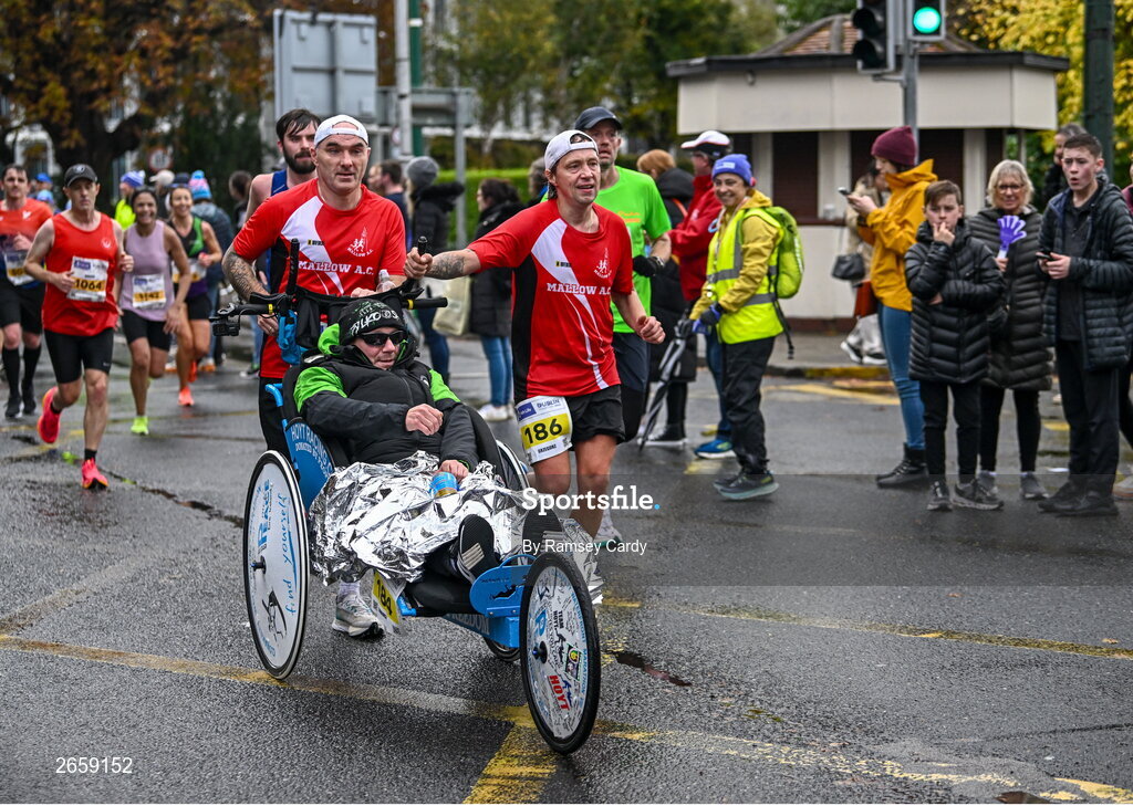 29 October 2023; Andrzej Chomicz and Grzegorz Kozimala during the 2023 Irish Life Dublin Marathon. Thousands of runners took to the Fitzwilliam Square start line, to participate in the 42nd running of the Dublin Marathon. Photo by Ramsey Cardy/Sportsfile