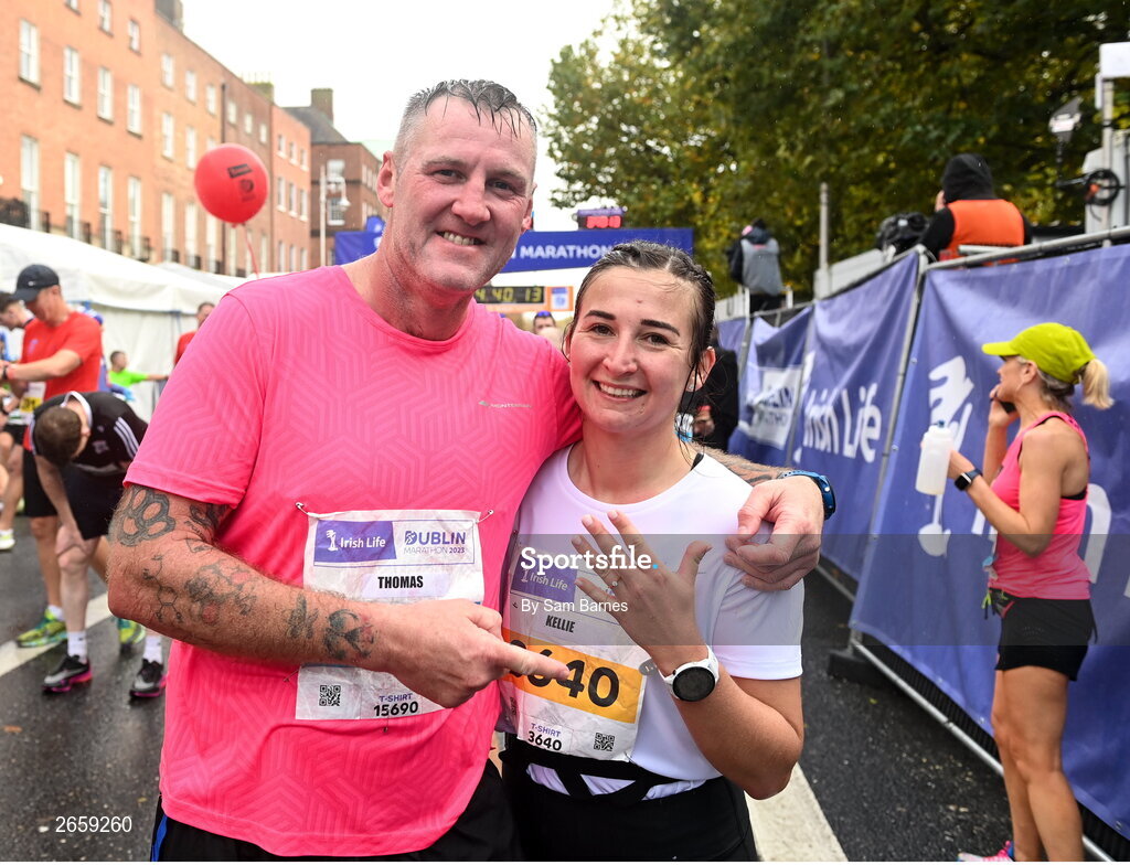 29 October 2023; Thomas Sheahan from Carlow and Kellie Sheehan from Carlow after recently getting engaged after the 2023 Irish Life Dublin Marathon. Thousands of runners took to the Fitzwilliam Square start line, to participate in the 42nd running of the Dublin Marathon. Photo by Sam Barnes/Sportsfile