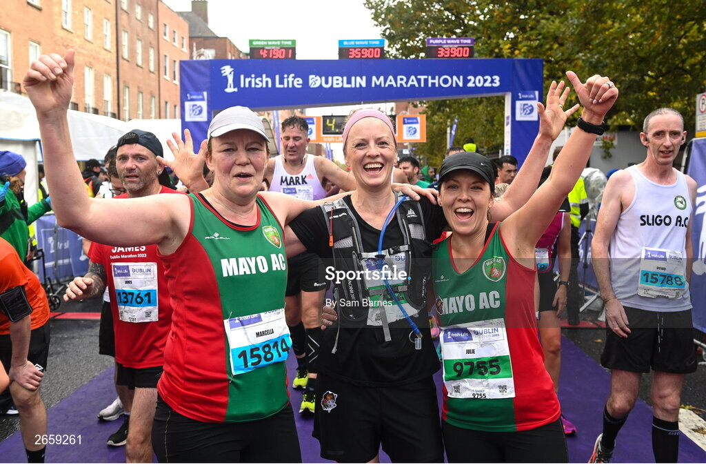 29 October 2023; Marcella McDonnell from Mayo, Jane McNicholas from Derry, and Julie Higgins from Mayo, after the 2023 Irish Life Dublin Marathon. Thousands of runners took to the Fitzwilliam Square start line, to participate in the 42nd running of the Dublin Marathon. Photo by Sam Barnes/Sportsfile