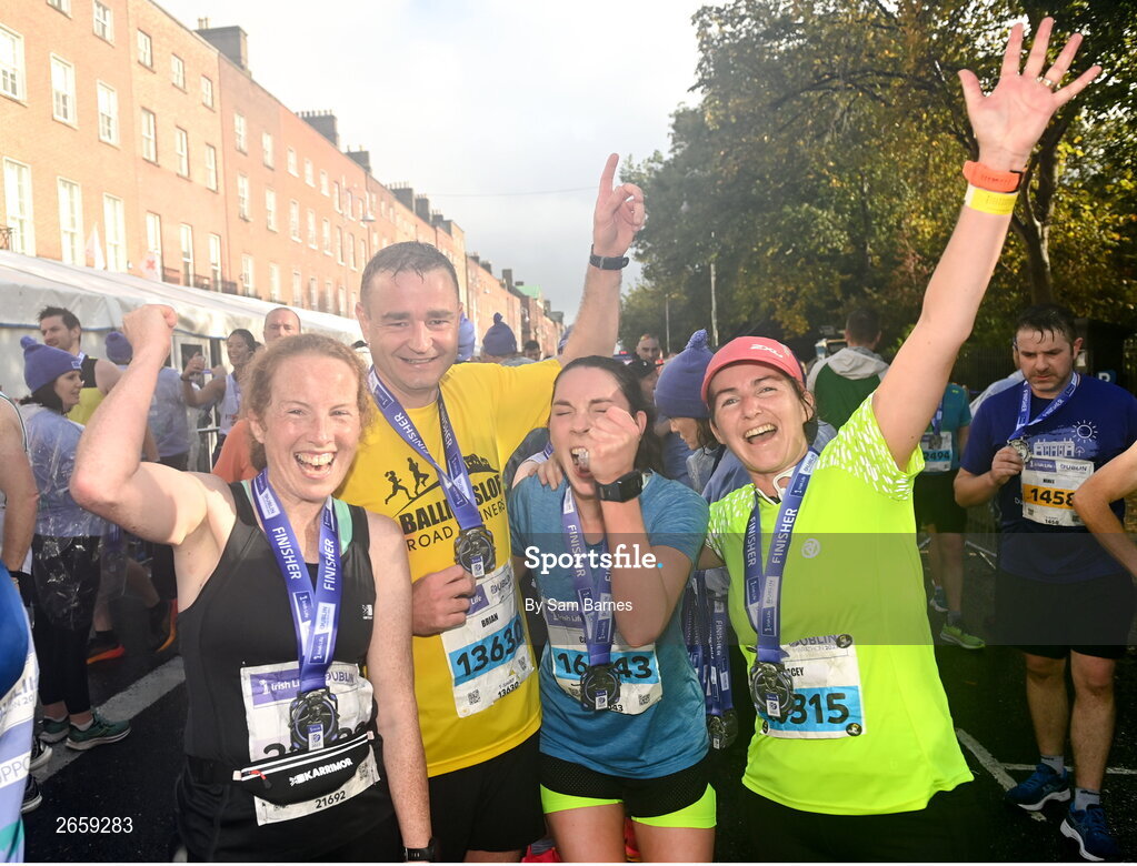 29 October 2023; Participants with their medals after the 2023 Irish Life Dublin Marathon. Thousands of runners took to the Fitzwilliam Square start line, to participate in the 42nd running of the Dublin Marathon. Photo by Sam Barnes/Sportsfile