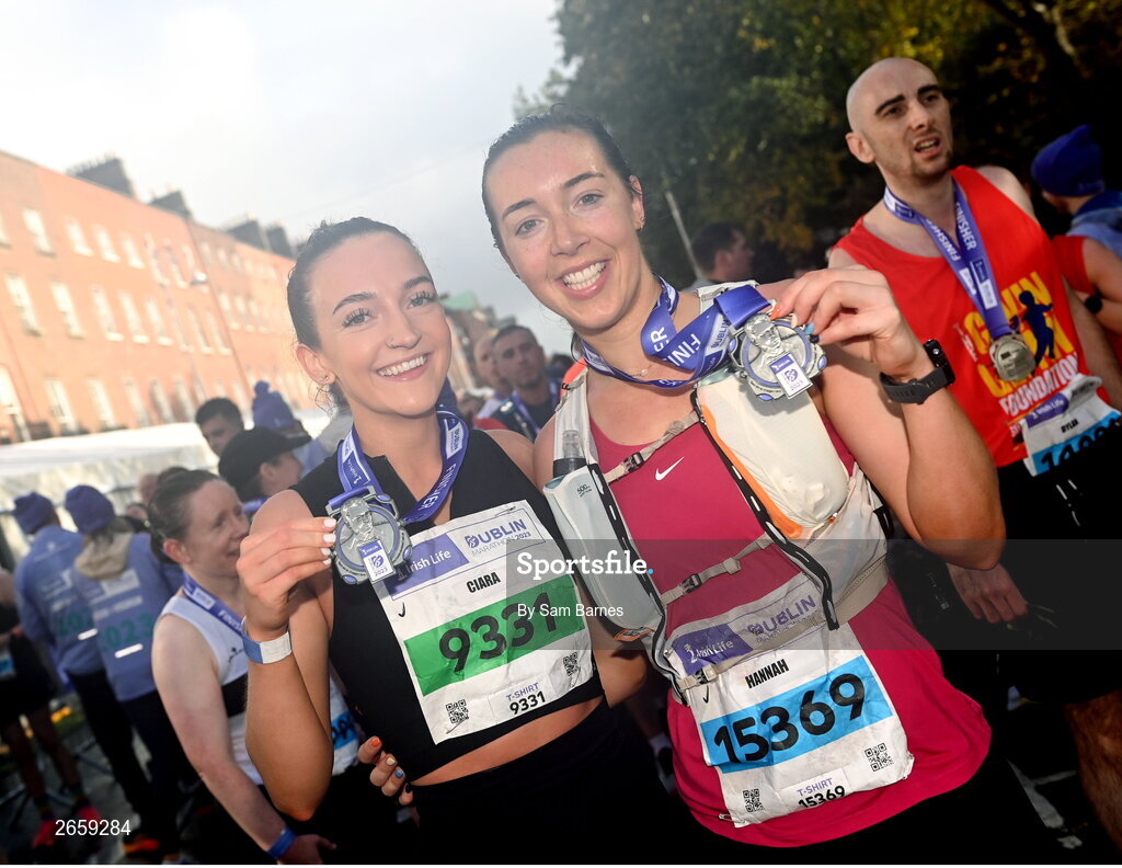 29 October 2023; Sean Tonra and Hannah Cleary from Mayo with their medals after the 2023 Irish Life Dublin Marathon. Thousands of runners took to the Fitzwilliam Square start line, to participate in the 42nd running of the Dublin Marathon. Photo by Sam Barnes/Sportsfile