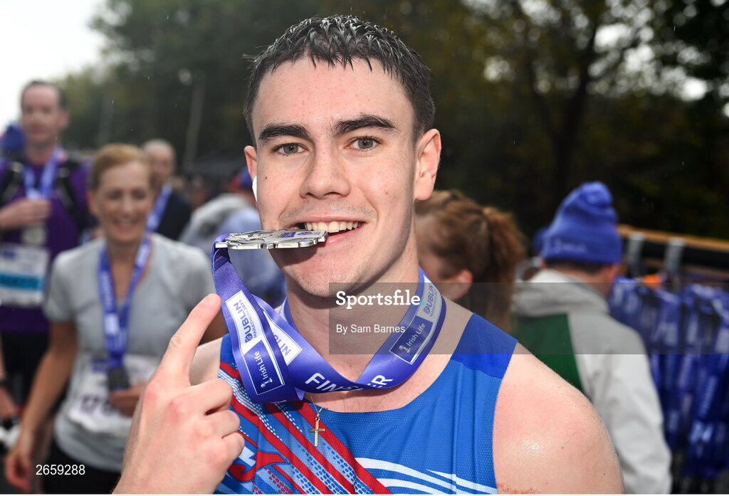 29 October 2023; Harry Linehan from Cork with his medal after the 2023 Irish Life Dublin Marathon. Thousands of runners took to the Fitzwilliam Square start line, to participate in the 42nd running of the Dublin Marathon. Photo by Sam Barnes/Sportsfile