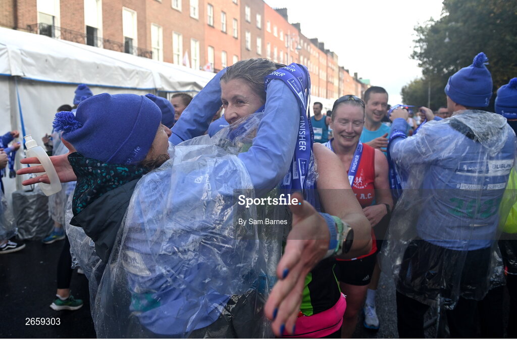 29 October 2023; Participants receive their medals after the 2023 Irish Life Dublin Marathon. Thousands of runners took to the Fitzwilliam Square start line, to participate in the 42nd running of the Dublin Marathon. Photo by Sam Barnes/Sportsfile