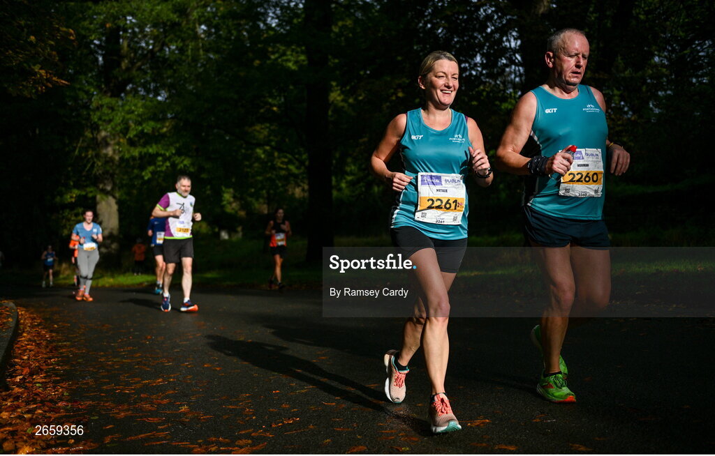 29 October 2023; Natalie Bowbanks, left, and Norman Richmond during the 2023 Irish Life Dublin Marathon. Thousands of runners took to the Fitzwilliam Square start line, to participate in the 42nd running of the Dublin Marathon. Photo by Ramsey Cardy/Sportsfile