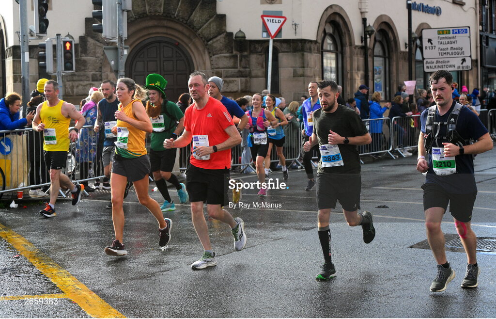 29 October 2023; Participants pass through Terenure Road East during the 2023 Irish Life Dublin Marathon. Thousands of runners took to the Fitzwilliam Square start line, to participate in the 42nd running of the Dublin Marathon. Photo by Ray McManus/Sportsfile