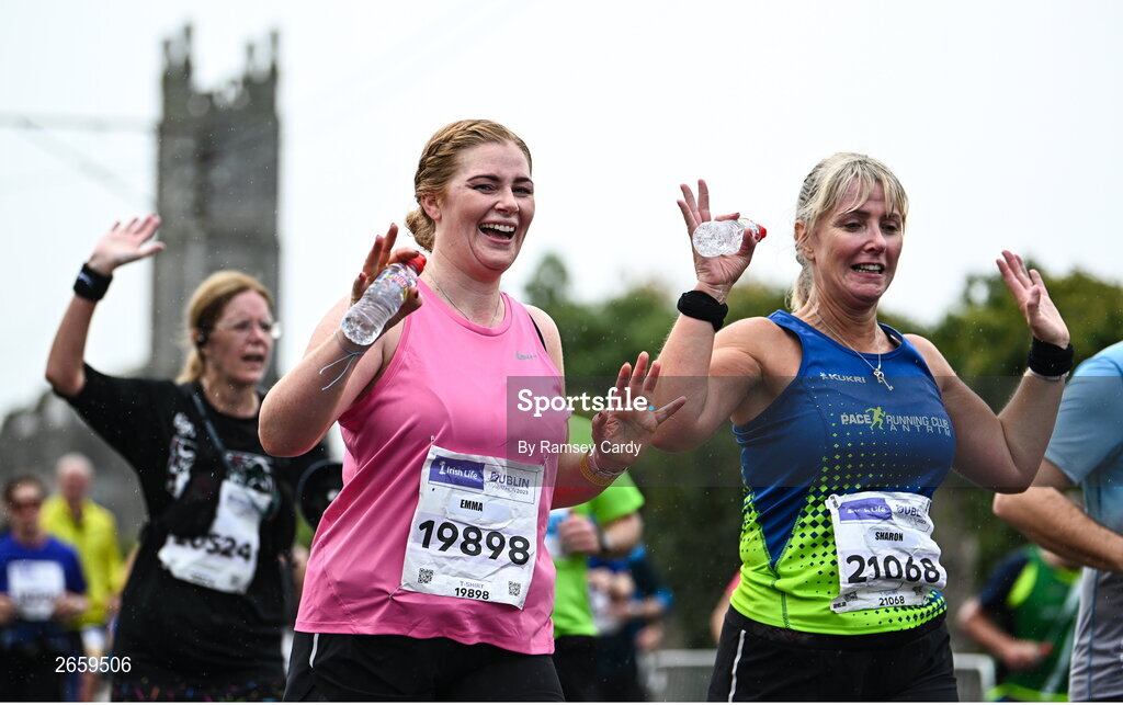 29 October 2023; Emma Mc Peake, left, and Sharon Shields during the 2023 Irish Life Dublin Marathon. Thousands of runners took to the Fitzwilliam Square start line, to participate in the 42nd running of the Dublin Marathon. Photo by Ramsey Cardy/Sportsfile