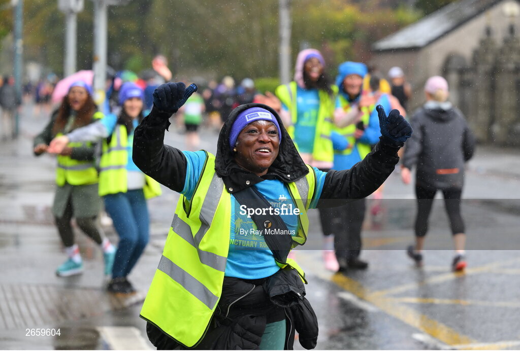 29 October 2023; A cheerleader urges on the runners during the 2023 Irish Life Dublin Marathon. Thousands of runners took to the Fitzwilliam Square start line, to participate in the 42nd running of the Dublin Marathon. Photo by Ray McManus/Sportsfile