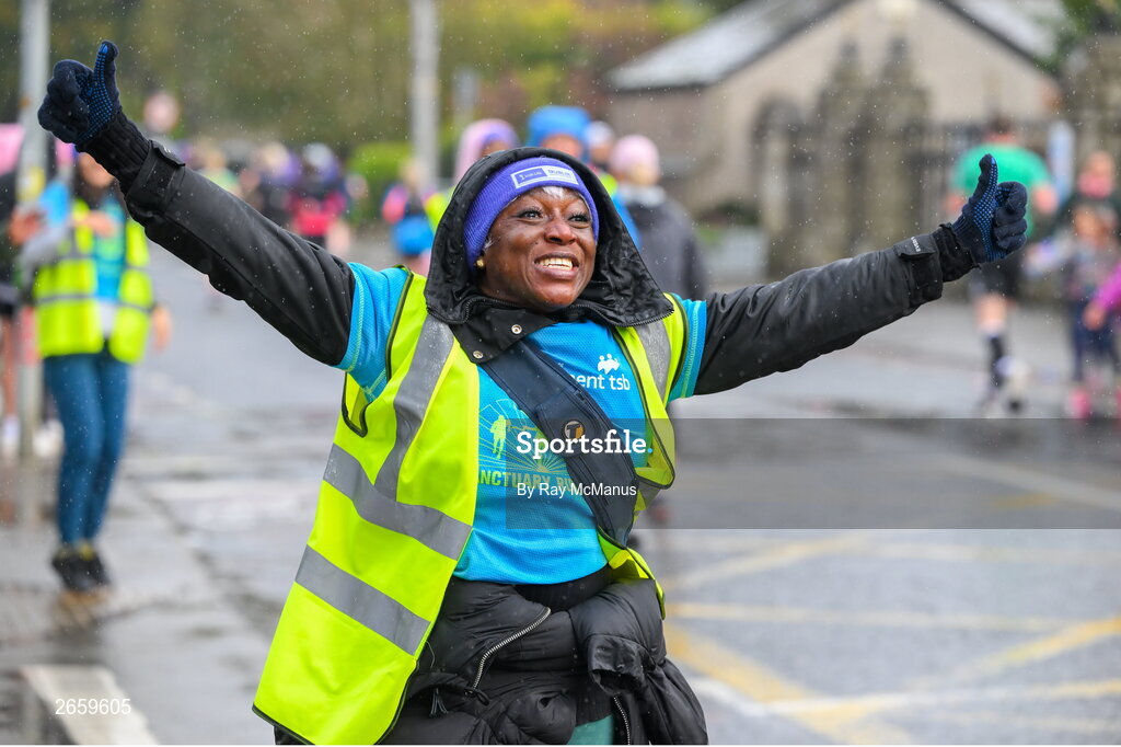 29 October 2023; A cheerleader urges on the runners during the 2023 Irish Life Dublin Marathon. Thousands of runners took to the Fitzwilliam Square start line, to participate in the 42nd running of the Dublin Marathon. Photo by Ray McManus/Sportsfile