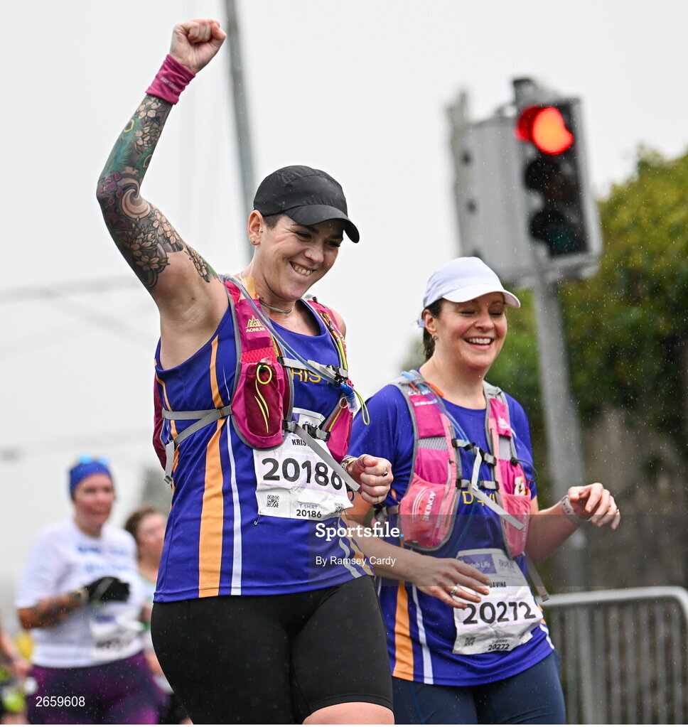 29 October 2023; Kristy Moreland, left, and Davina McCay during the 2023 Irish Life Dublin Marathon. Thousands of runners took to the Fitzwilliam Square start line, to participate in the 42nd running of the Dublin Marathon. Photo by Ramsey Cardy/Sportsfile
