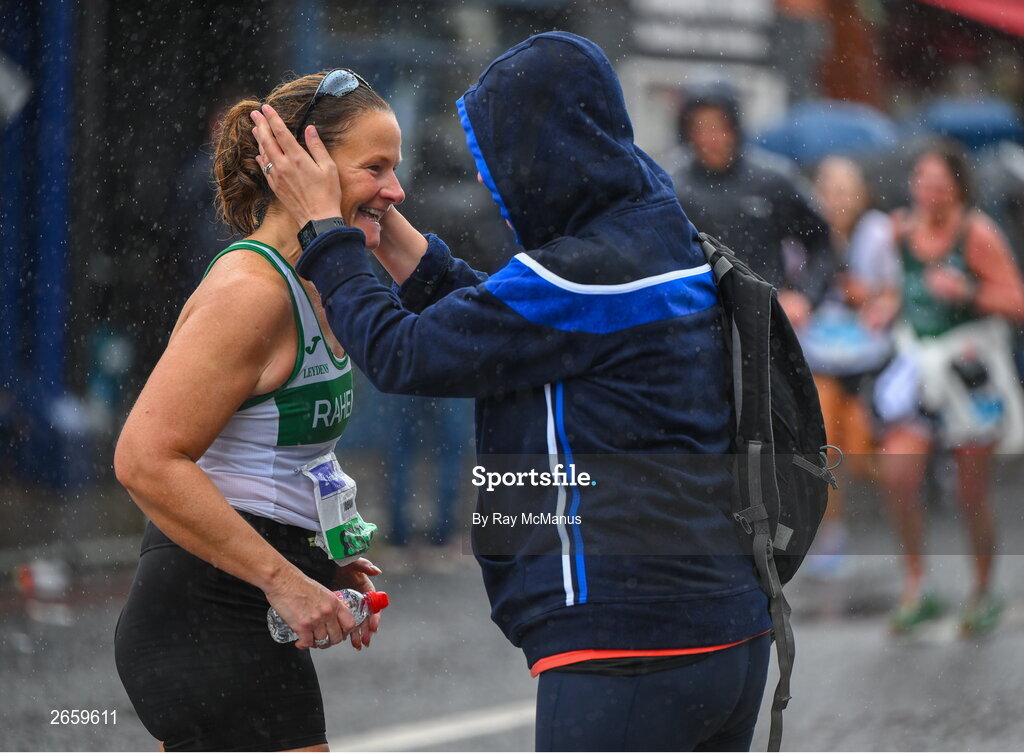 29 October 2023; Sarah Dillon goes to hug Siobhan Foley, left, during the 2023 Irish Life Dublin Marathon. Thousands of runners took to the Fitzwilliam Square start line, to participate in the 42nd running of the Dublin Marathon. Photo by Ray McManus/Sportsfile