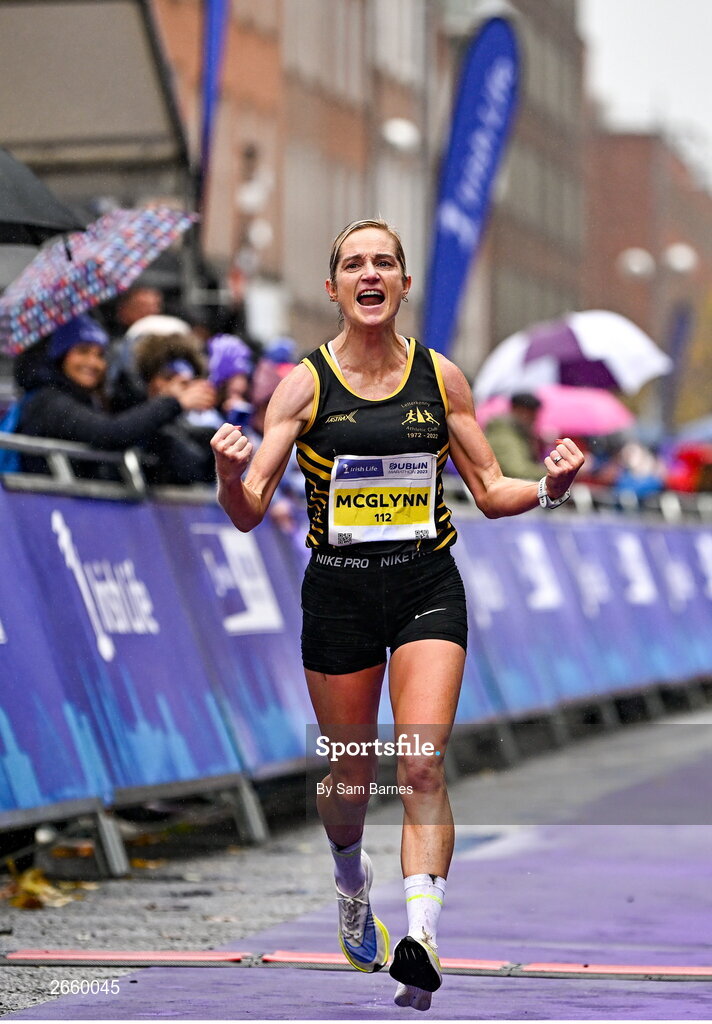 29 October 2023; Women's National Champion Ann-Marie McGlynn celebrates after the 2023 Irish Life Dublin Marathon. Thousands of runners took to the Fitzwilliam Square start line, to participate in the 42nd running of the Dublin Marathon. Photo by Sam Barnes/Sportsfile