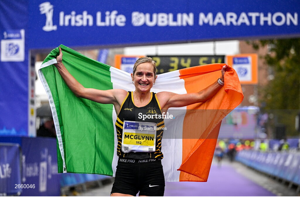 29 October 2023; Women's National Champion Ann-Marie McGlynn celebrates after the 2023 Irish Life Dublin Marathon. Thousands of runners took to the Fitzwilliam Square start line, to participate in the 42nd running of the Dublin Marathon. Photo by Sam Barnes/Sportsfile