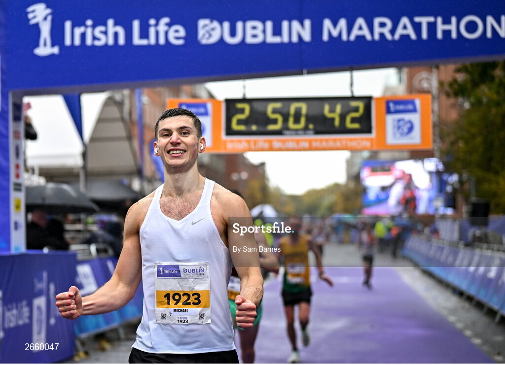 29 October 2023; Michael Boland from Dublin 15,  celebrates finishing the 2023 Irish Life Dublin Marathon. Thousands of runners took to the Fitzwilliam Square start line, to participate in the 42nd running of the Dublin Marathon. Photo by Sam Barnes/Sportsfile