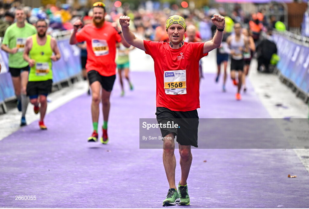 29 October 2023; James Butchart from Kildare, celebrates finishing the 2023 Irish Life Dublin Marathon. Thousands of runners took to the Fitzwilliam Square start line, to participate in the 42nd running of the Dublin Marathon. Photo by Sam Barnes/Sportsfile