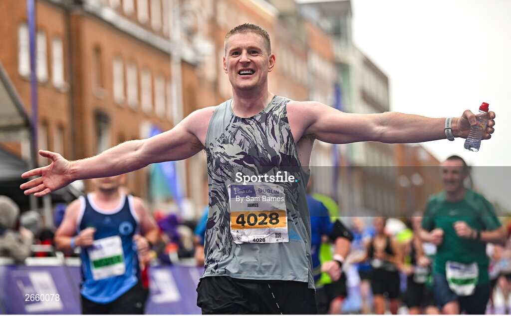 29 October 2023; James Cosgrave from Dublin celebrates after finishing the 2023 Irish Life Dublin Marathon. Thousands of runners took to the Fitzwilliam Square start line, to participate in the 42nd running of the Dublin Marathon. Photo by Sam Barnes/Sportsfile
