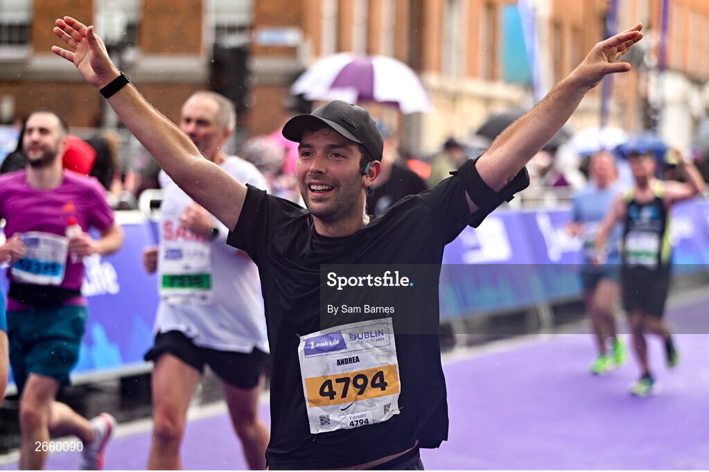29 October 2023; Andrea Guadalupi celebrates finishing the 2023 Irish Life Dublin Marathon. Thousands of runners took to the Fitzwilliam Square start line, to participate in the 42nd running of the Dublin Marathon. Photo by Sam Barnes/Sportsfile