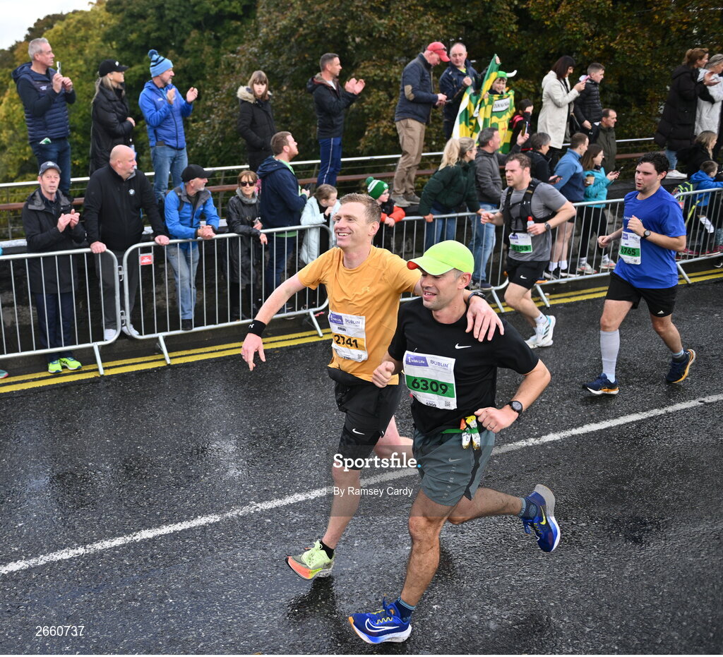 29 October 2023; Fergus Brady from Dublin 6, and Barry Lyons from Kildare, during the 2023 Irish Life Dublin Marathon. Thousands of runners took to the Fitzwilliam Square start line, to participate in the 42nd running of the Dublin Marathon. Photo by Ramsey Cardy/Sportsfile