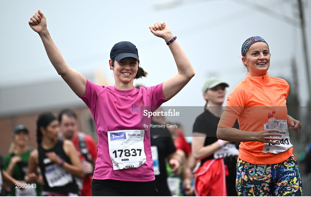 29 October 2023; Niamh Delaney from Dublin, left, and Caroline O'Neill from Kildare during the 2023 Irish Life Dublin Marathon. Thousands of runners took to the Fitzwilliam Square start line, to participate in the 42nd running of the Dublin Marathon. Photo by Ramsey Cardy/Sportsfile