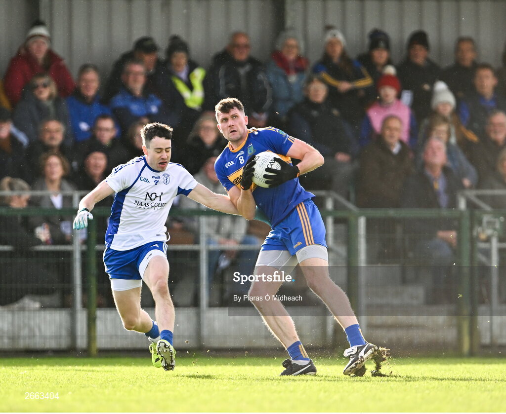 5 November 2023; Adam Flanagan of Summerhill in action against Cathal Daly of Naas during the AIB Leinster GAA Football Senior Club Championship quarter-final match between Naas and Summerhill at Manguard Park in Kildare. Photo by Piaras Ó Mídheach/Sportsfile