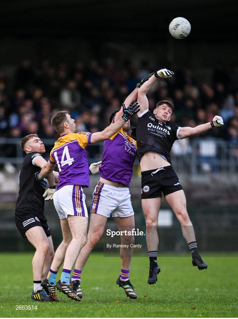5 November 2023; Anthony Morgan of Kilcoo wins possession from the throw-in against Ryan Jones of Derrygonnelly Harps during the AIB Ulster GAA Football Senior Club Championship round 1 match between Derrygonnelly Harps of Fermanagh and Kilcoo of Down at Brewster Park in Enniskillen, Fermanagh. Photo by Ramsey Cardy/Sportsfile