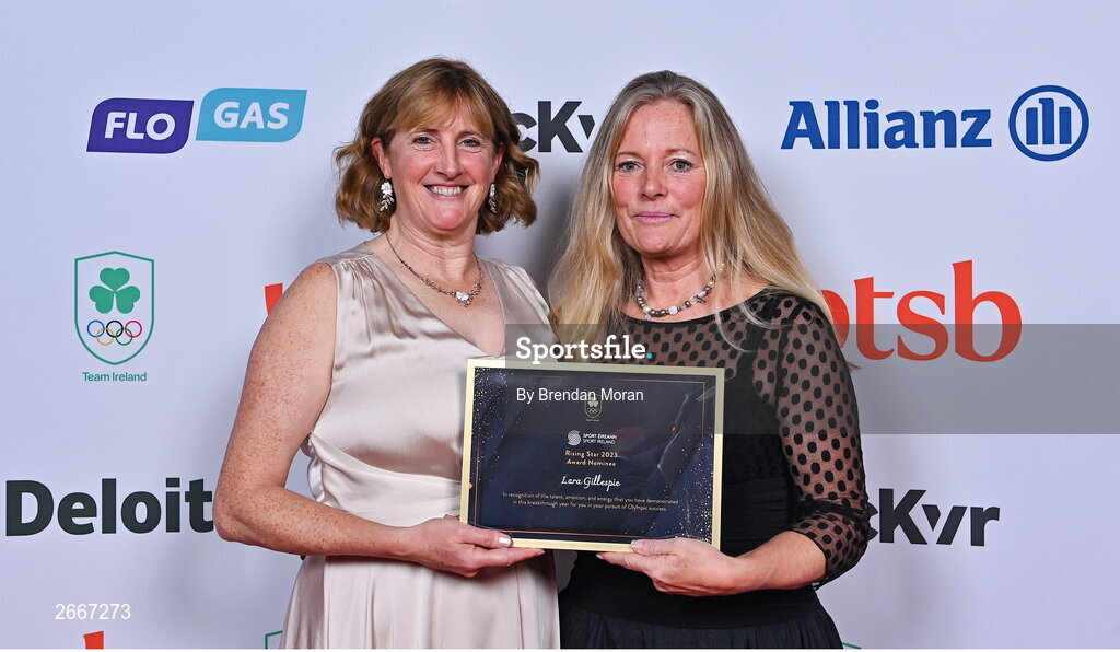 11 November 2023; Suzanne Clarke, on behalf of Lara Gillespie,  is presented with the Sport Ireland Rising Star award by Sport Ireland chief executive, Dr Úna May, on her behalf at the Team Ireland Olympic Ball at the Mansion House in Dublin. The event was a joint celebration of the brilliant performances of Team Ireland athletes at the European Games this summer, as well as the announcement of the winners of the Olympic Federation of Ireland Annual Awards. The event was attended by the Minister for Tourism, Culture, Arts, Gaeltacht, Sport and Media, Catherine Martin TD, Minister of State for Sport and Physical Education, Thomas Byrne TD, Olympic medallists, European Games athletes, Team Ireland Sponsors and Partners, Sport Ireland and the wider Olympic family. Photo by Brendan Moran/Sportsfile