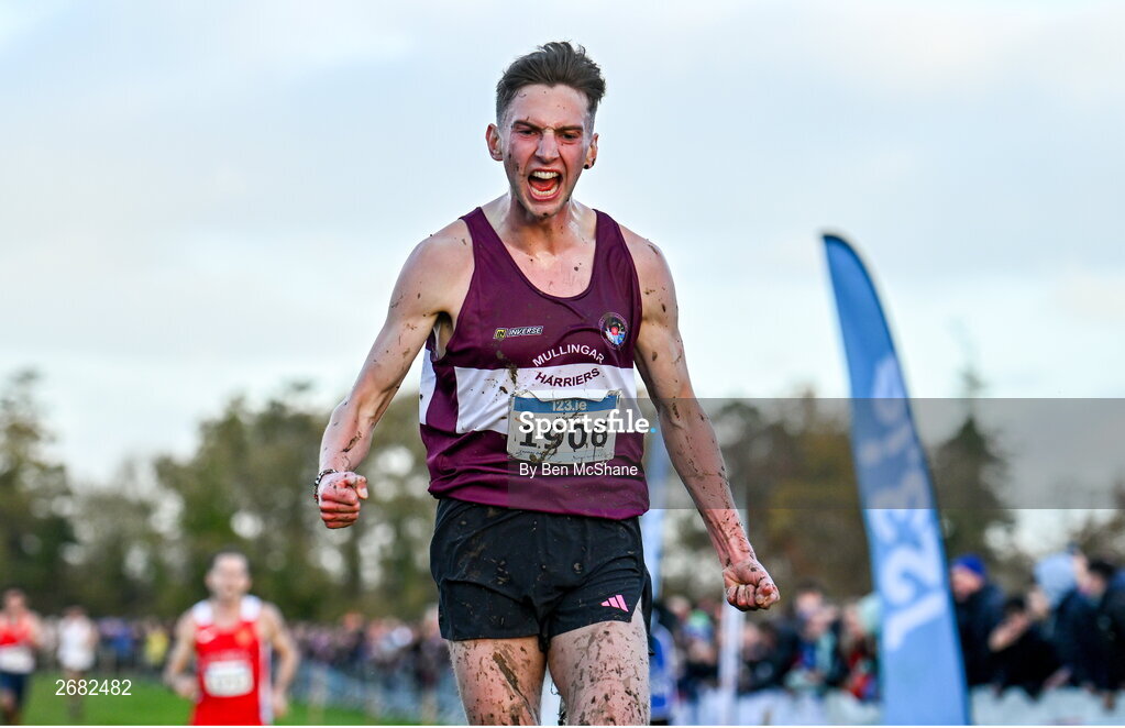 19 November 2023; Cormac Dalton of Mullingar Harriers AC, Westmeath, celebrates on his way to winning the Mens Senior 9000m during the 123.ie National Senior & Even Age Cross Country Championships at Gowran Demesne in Kilkenny. Photo by Ben McShane/Sportsfile