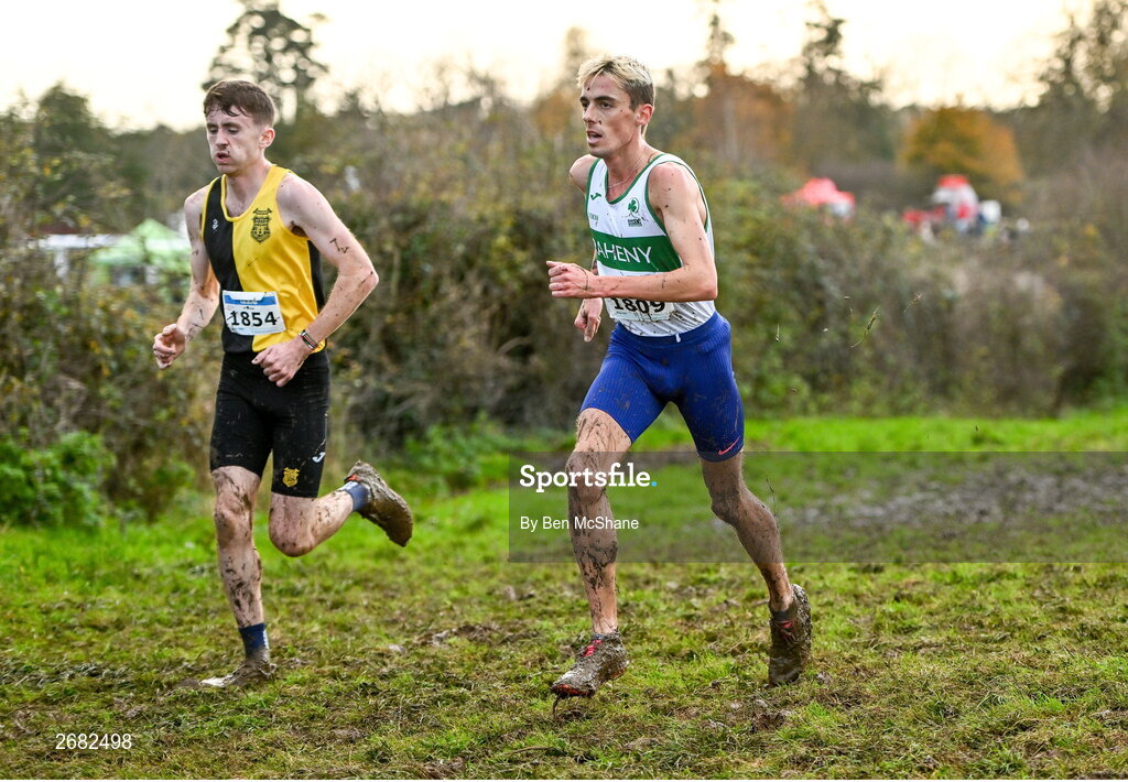 19 November 2023; Brian Fay of Raheny Shamrock AC, Dublin, right, and Peter Lynch of Kilkenny City Harriers AC, Kilkenny, competing in the Mens Senior 9000m during the 123.ie National Senior & Even Age Cross Country Championships at Gowran Demesne in Kilkenny. Photo by Ben McShane/Sportsfile